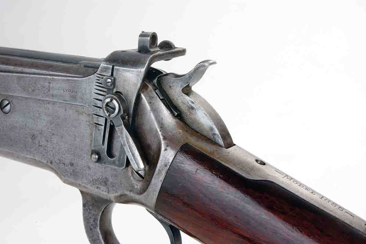 Many vintage sporting rifles such as this Winchester Model 1886 were fitted with side mounted aperture sights. This one is a Lyman No. 38 and is adjustable for both windage and elevation.